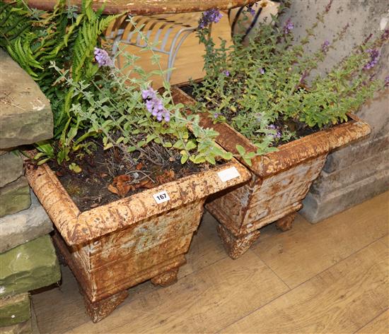 A pair of square cast iron garden urns, H.44cm